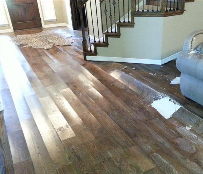 Buckled floors caused by severe water damage